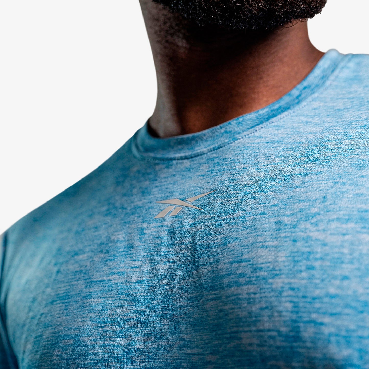 Camiseta Reebok Train Melange Tech Tee Hombre Azul